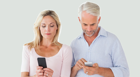 Fernandina Beach couple using smartphones